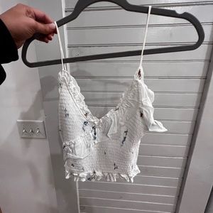 White tank top with ruffle detail